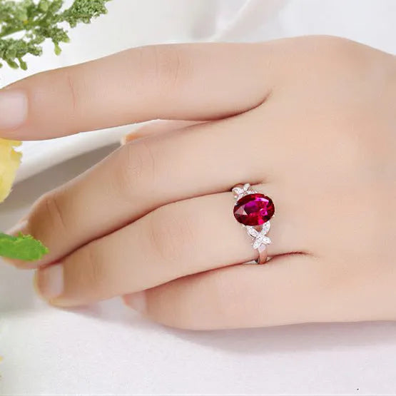 Women's copper butterfly ring with heart shape design in red and blue colour options