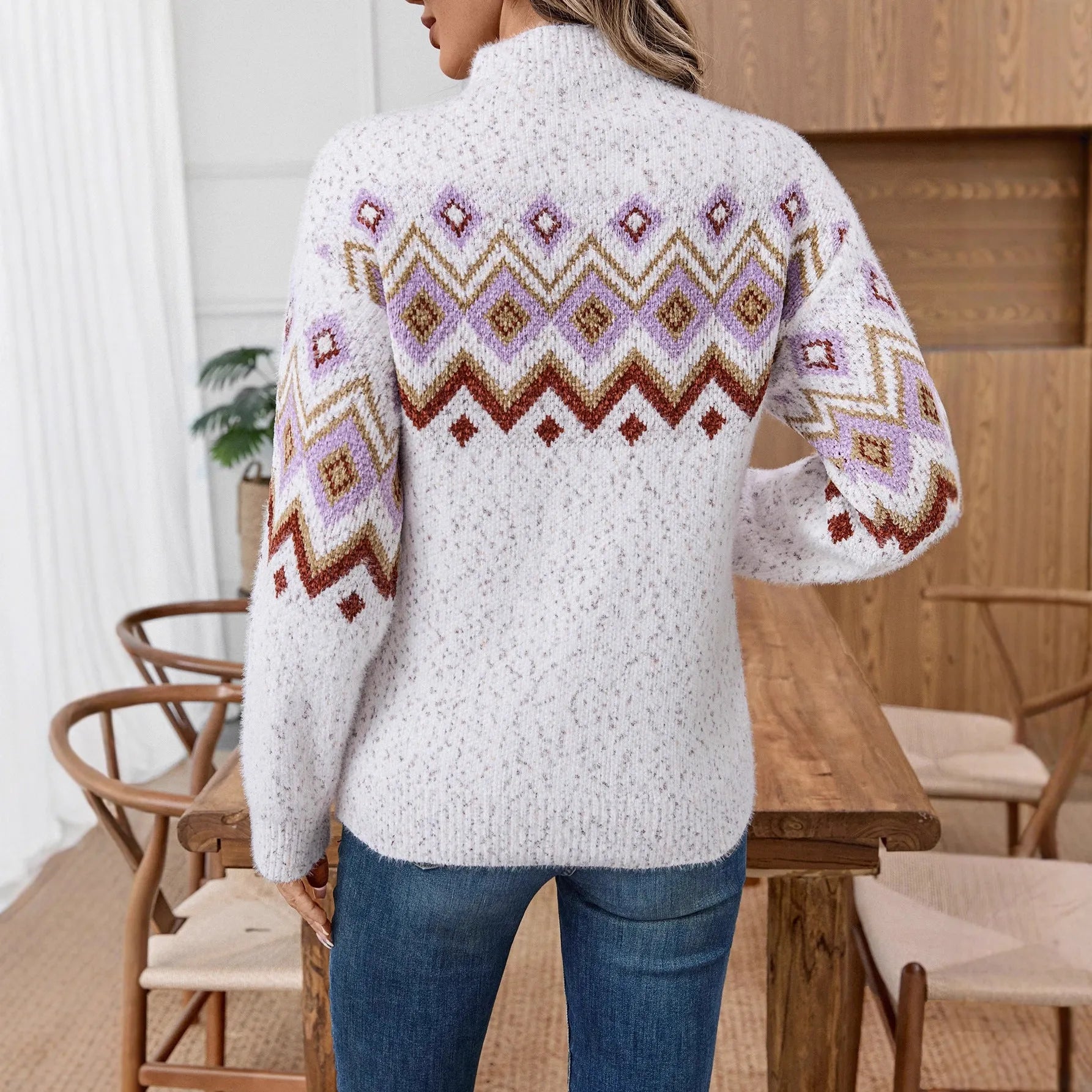 White loose-fit women's sweater with a half-turtleneck collar and geometric jacquard pattern on thick chenille fabric.