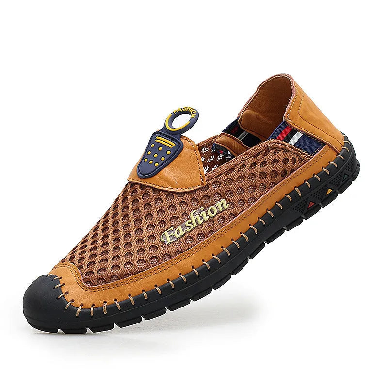 Men's brown mesh casual shoes with round toe and rubber sole on a plain background.