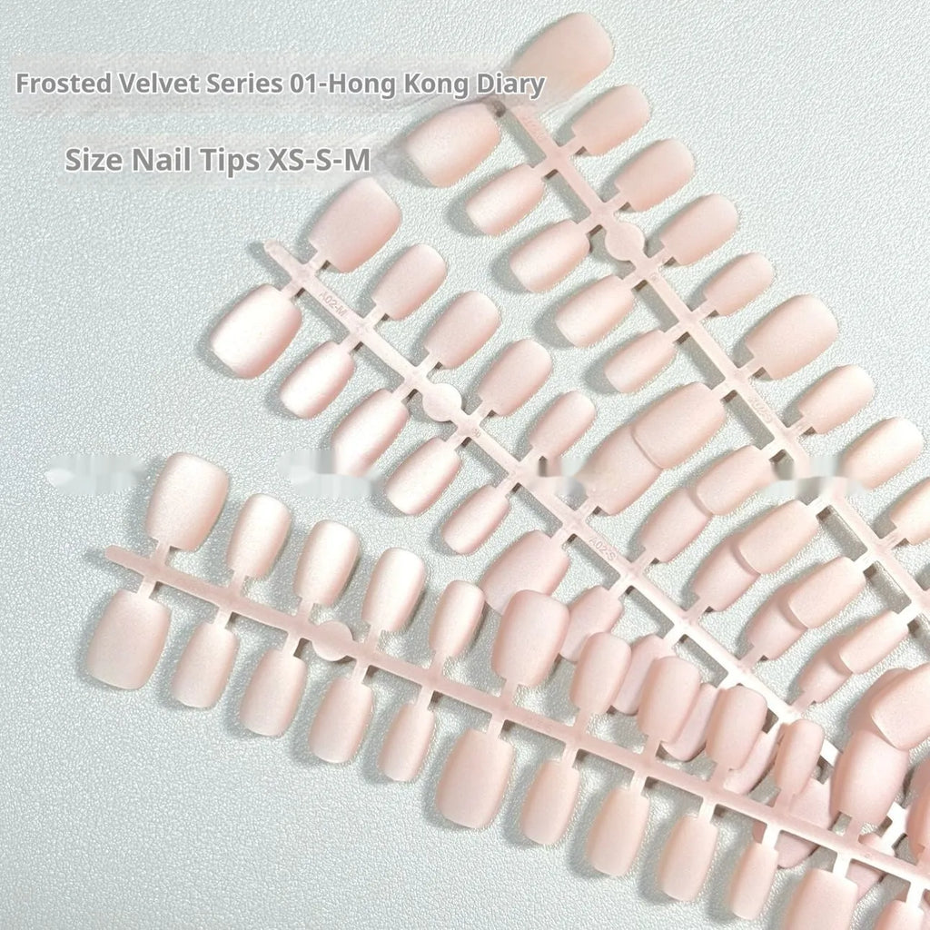 Frosted velvet Cat's Eye effect nail wraps showing aurora armour style on a hand, with short ladder XS, S, M sizing options.