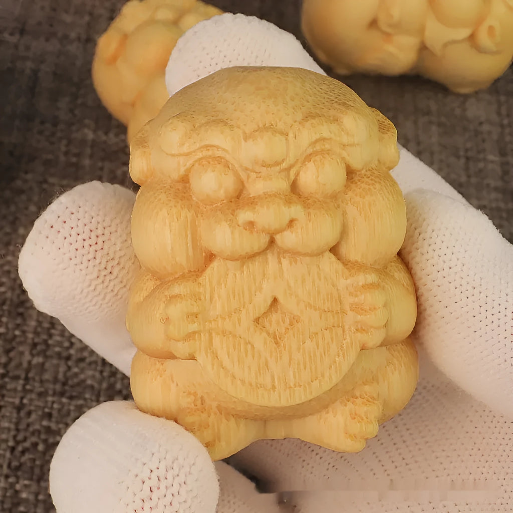 Solid bamboo carving ornament with take money motif measuring 4.5cm height