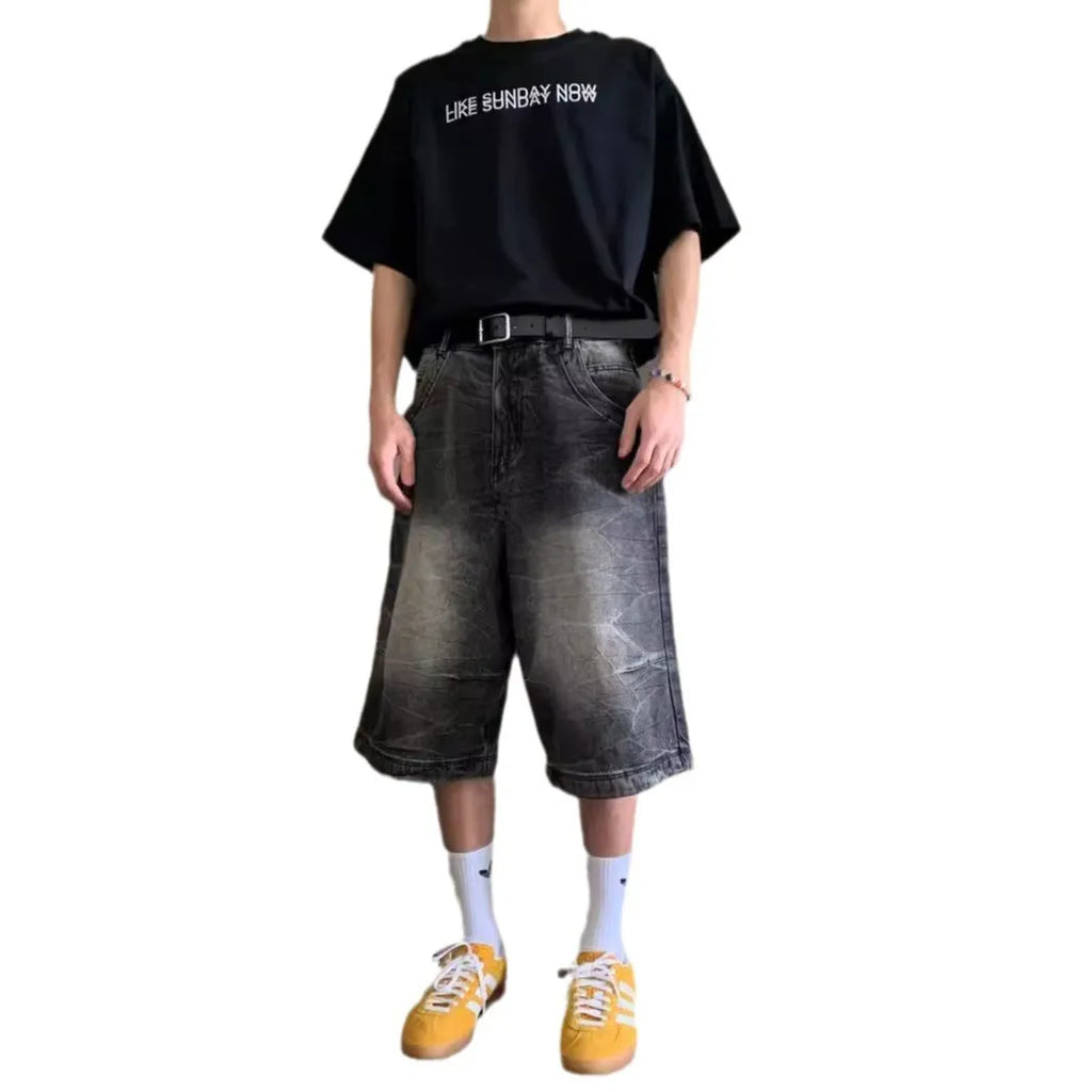 Men's loose fit casual denim shorts in a washed blue colour with a straight leg and mid-rise waist.
