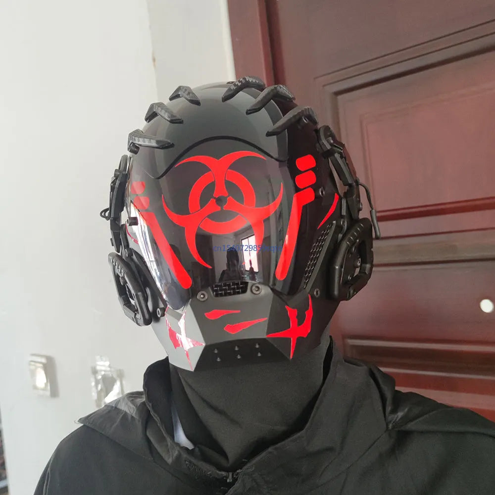 Black full face cybernetic prop helmet with bioweapon tech theme on a neutral background.