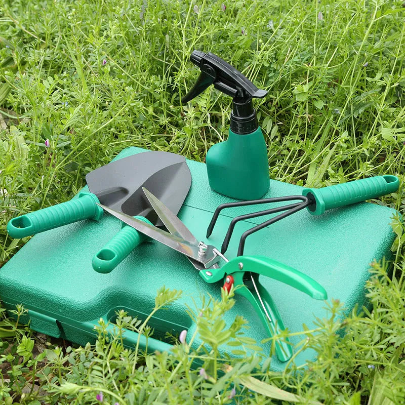 Ten-piece gardening tool set with iron heads and plastic handles in green colour