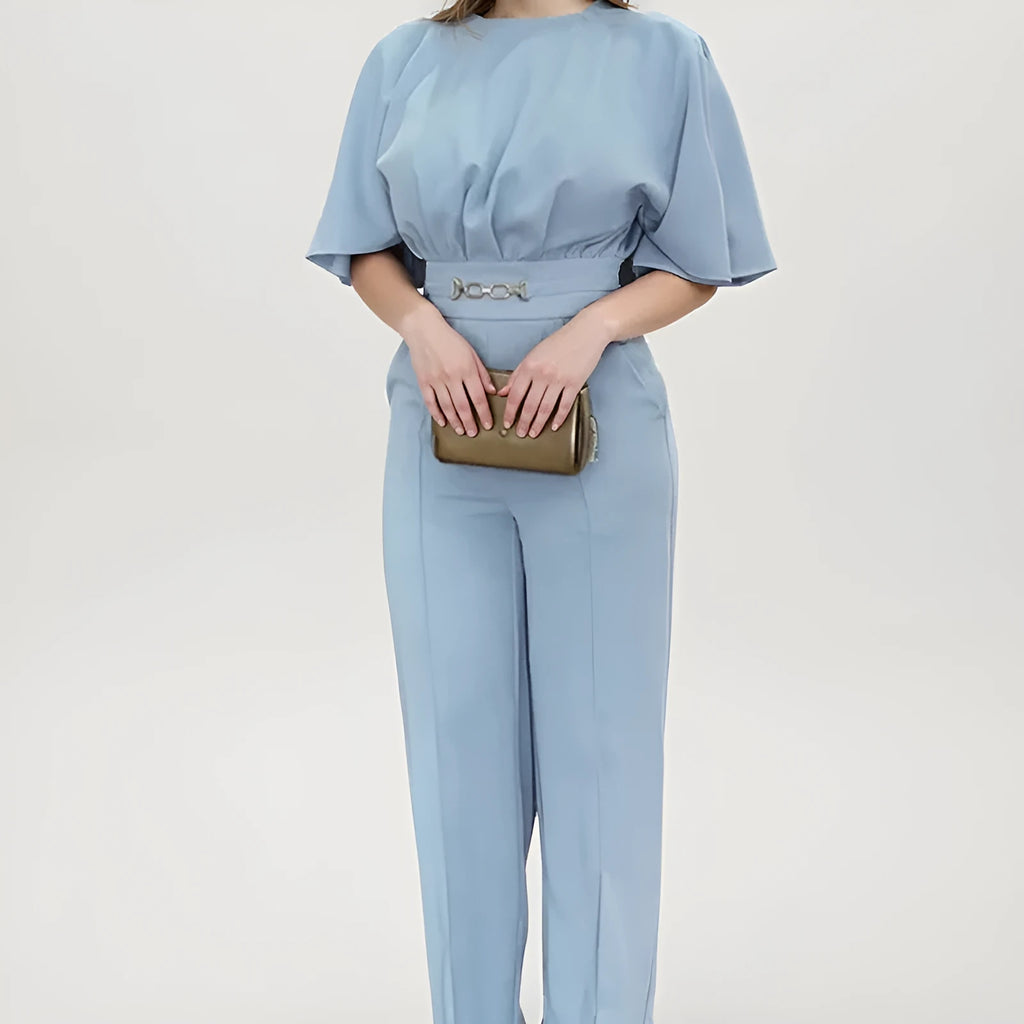 Blue men's casual polyester suit with long sleeve jacket and trousers on a hanger