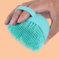 Blue silicone dog bath brush with flexible fingers for grooming and massage during pet baths.