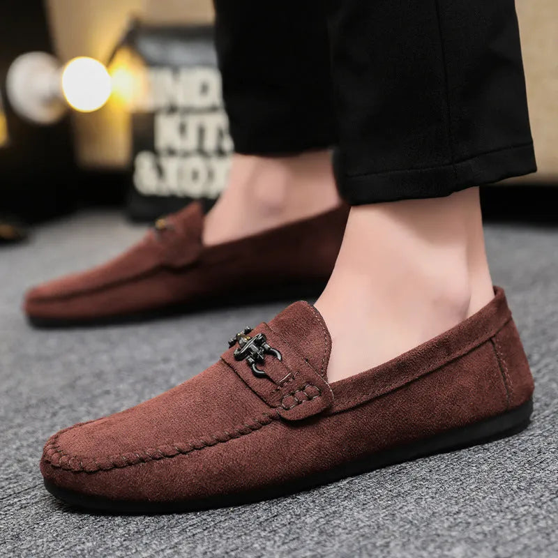 Men's black waterproof slip-on loafers with artificial PU leather upper and rubber sole.