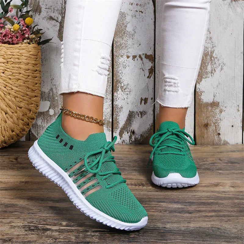 Beige lace-up mesh sneakers with round toe, rubber sole, and PU insole on a flat surface