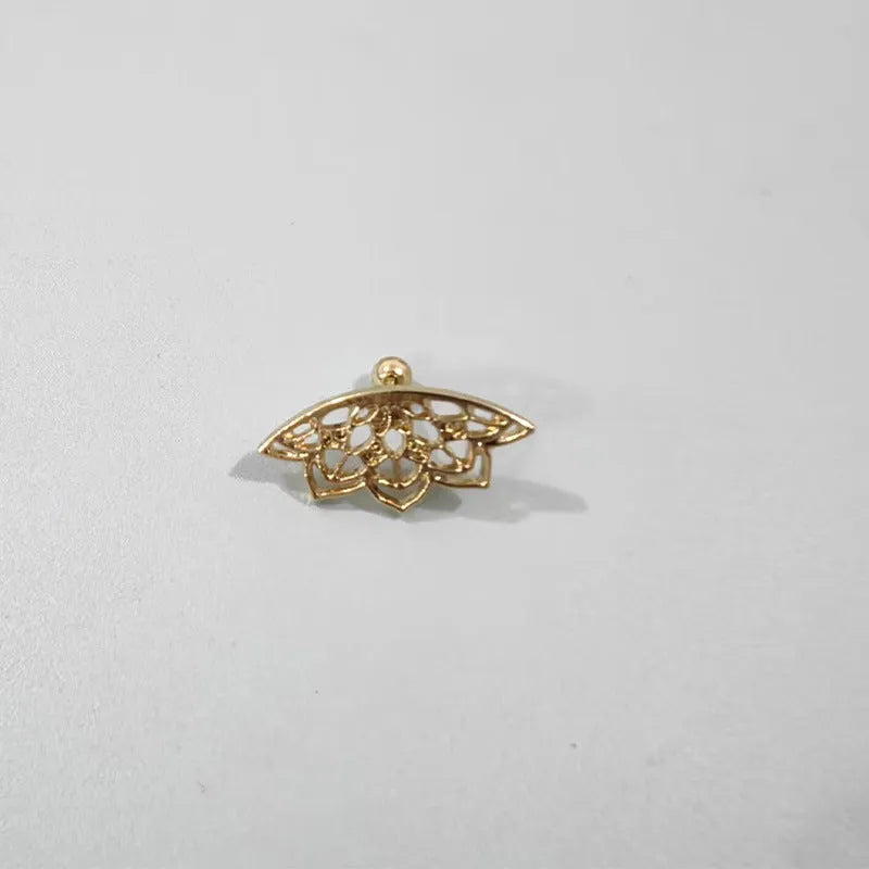 Metal spider web stud earrings in electroplated gold or silver finish, geometric mesh design.