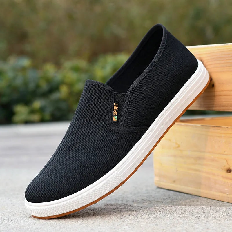 Men's black slip-on canvas cloth shoes with round toe and shallow mouth design