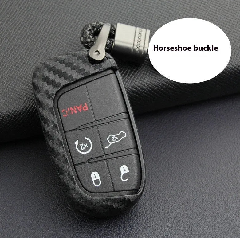 Carbon fibre pattern silicone protective case covering a Dodge, Chrysler, and Fiat car key fob
