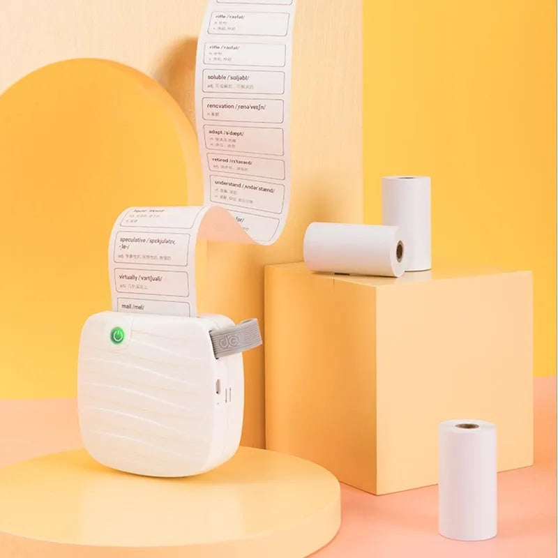 Three rolls of 57mm thermal paper in packaging for small thermal printers