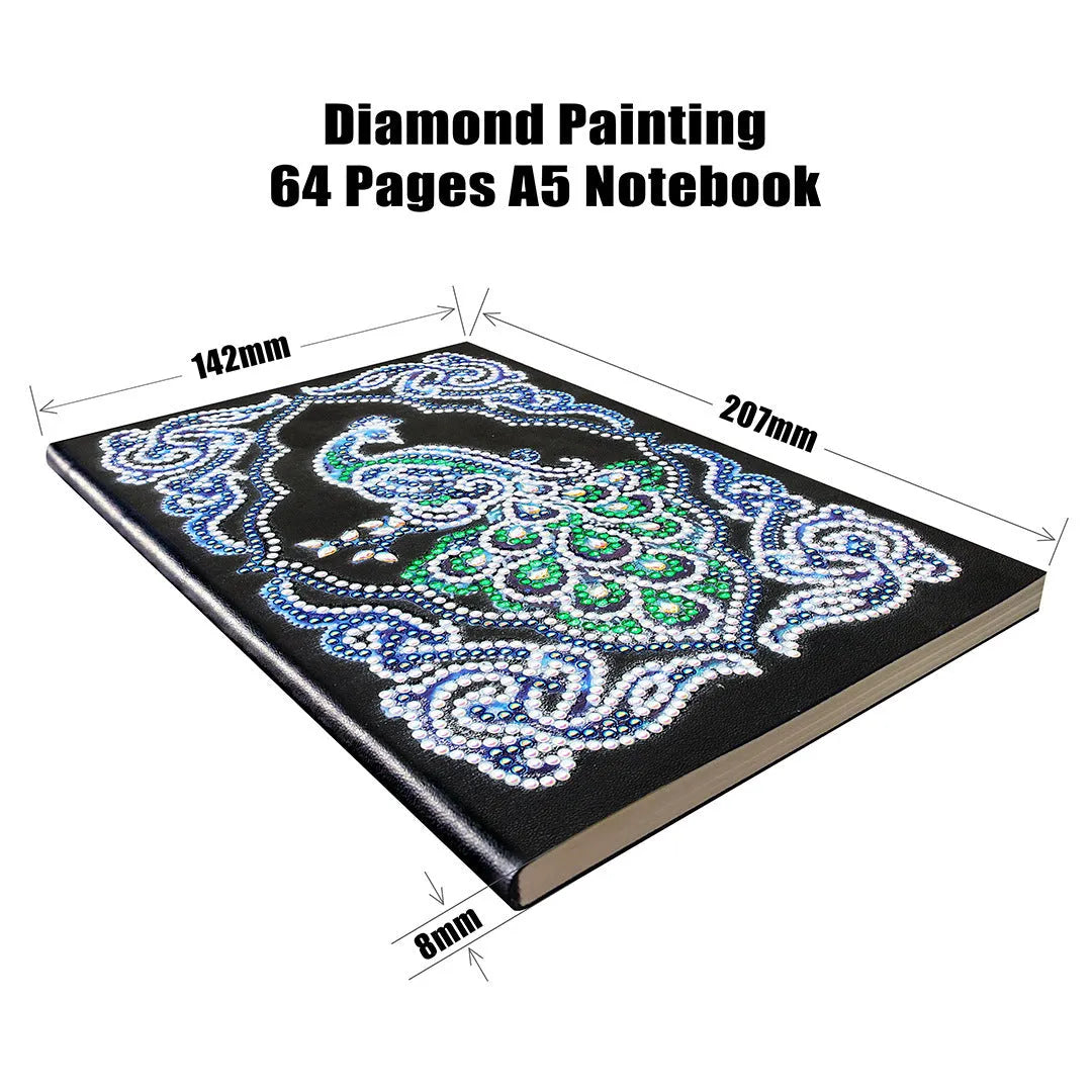 Peacock design diamond painting kit on a black A5 hardback notebook with drills and tools