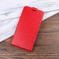 Honor 7X leather wallet phone case in crazy horse texture with visible card slots on the back.