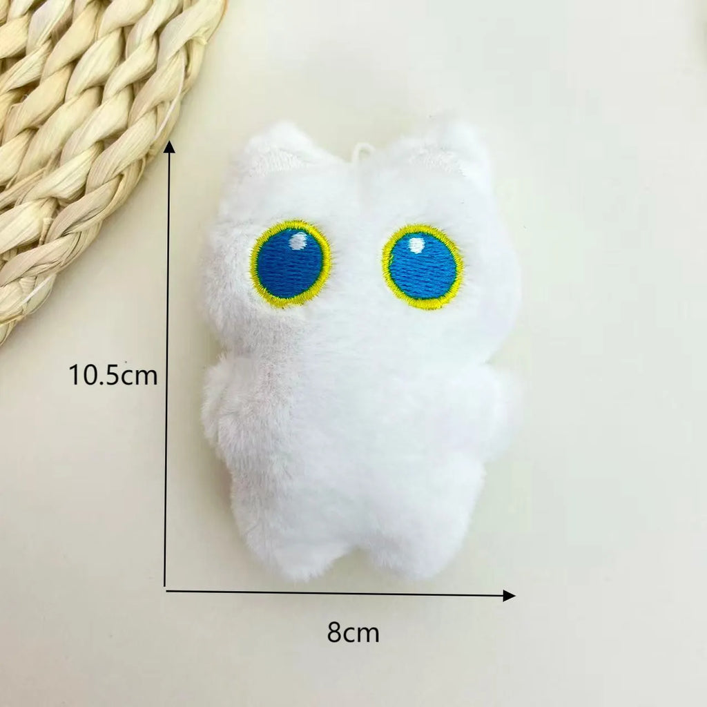 Cartoon big eye black cat doll plush with bead necklace as key decoration on a bag