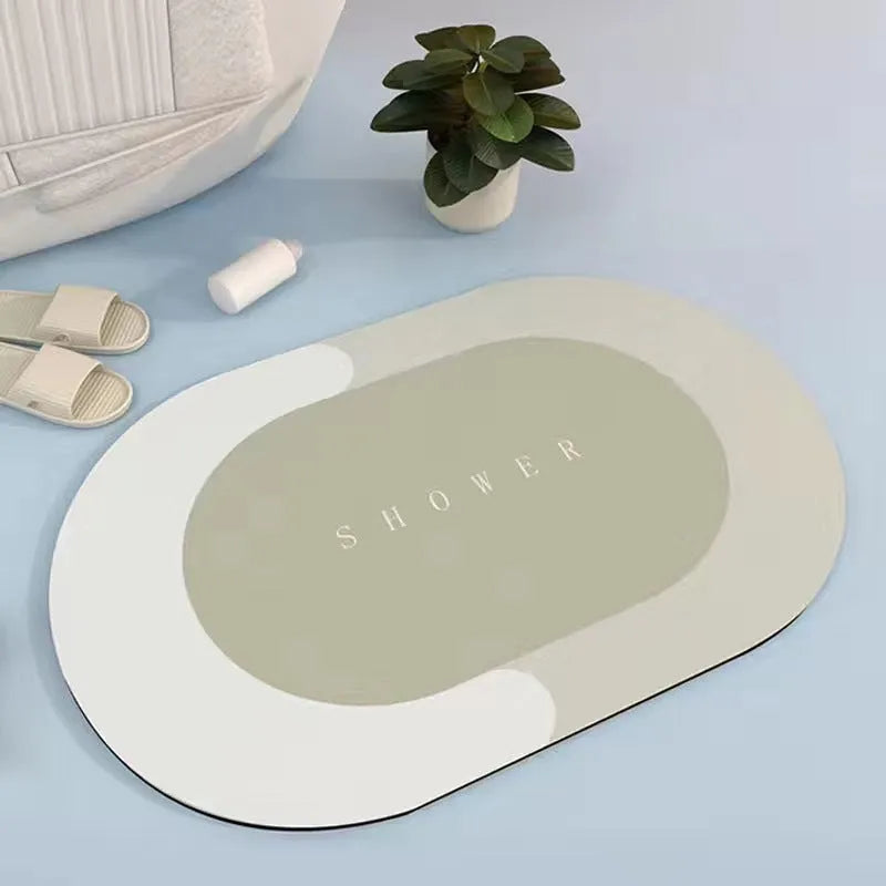 Super absorbent oval bath mat in grey with non-slip rubber bottom, 40x60cm