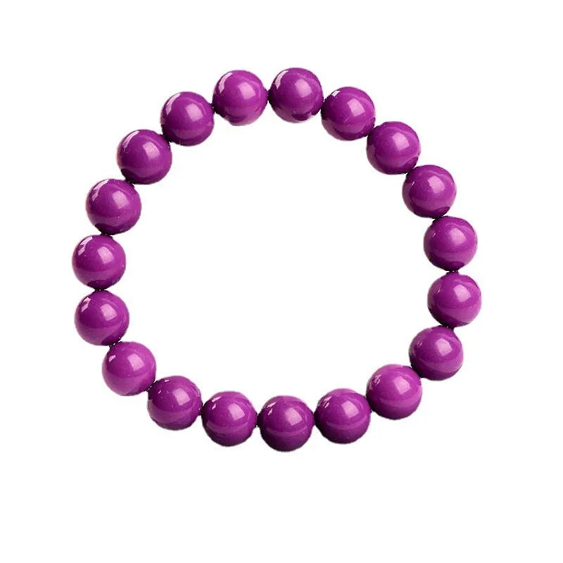 Single-strand Jiuya crystal bracelet in translucent purple mica with polished 8mm beads.