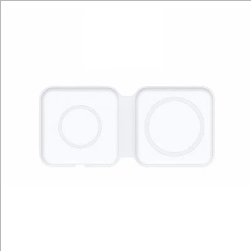White foldable magnetic wireless charger dock with phone attached, showing angled stand mode.
