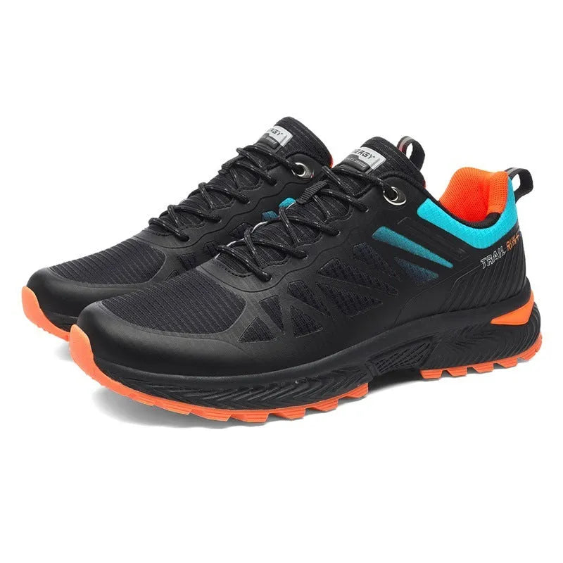 Plus size men's black and orange outdoor running shoe with mesh upper and lace-up front.