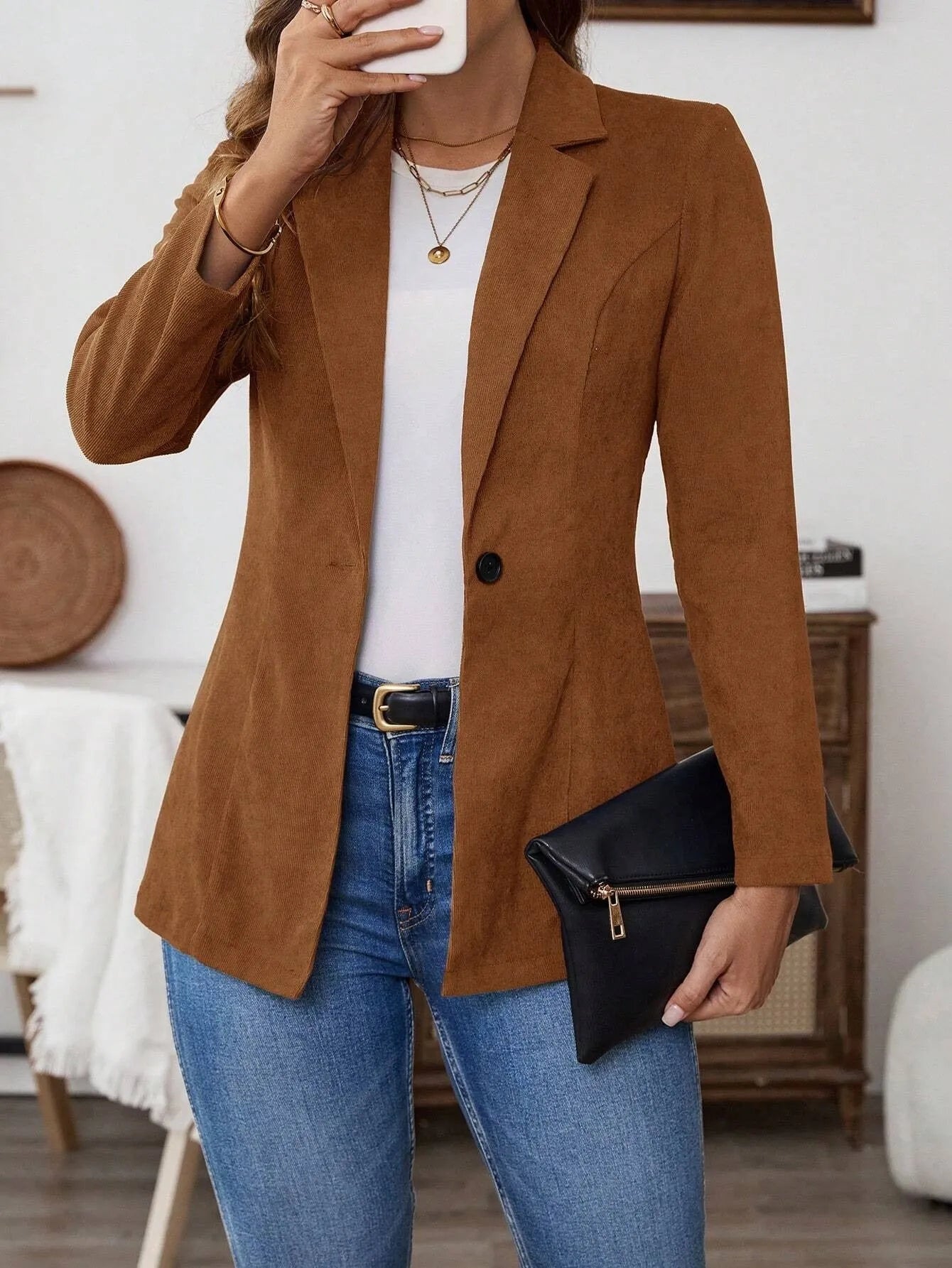 Brown men's long sleeve single-breasted suit coat with a lapel collar.