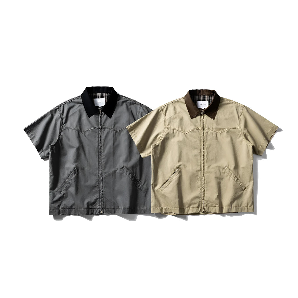Grey loose-fit short-sleeved cardigan-style overalls shirt on a hanger.