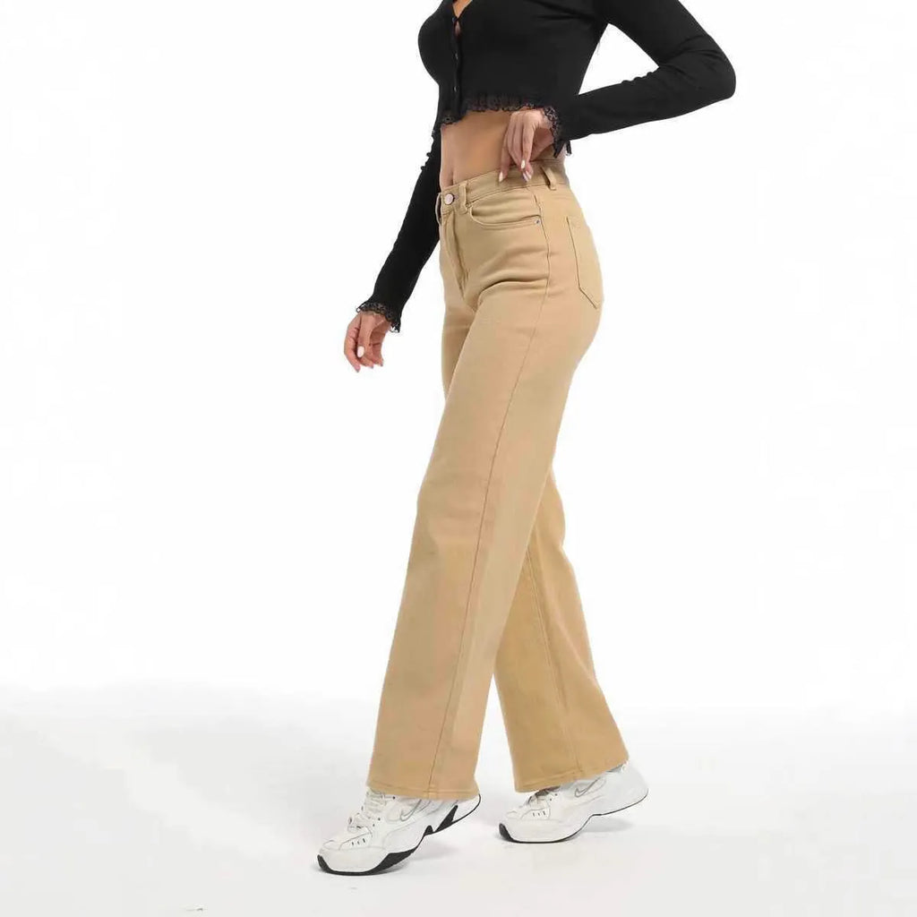 Women's high-waisted wide-leg straight jeans in apricot colour on a model.