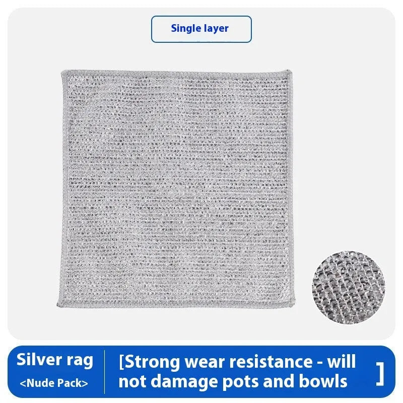 Silver microfiber cleaning rag with a built-in steel wire scrubber ball on a kitchen counter.