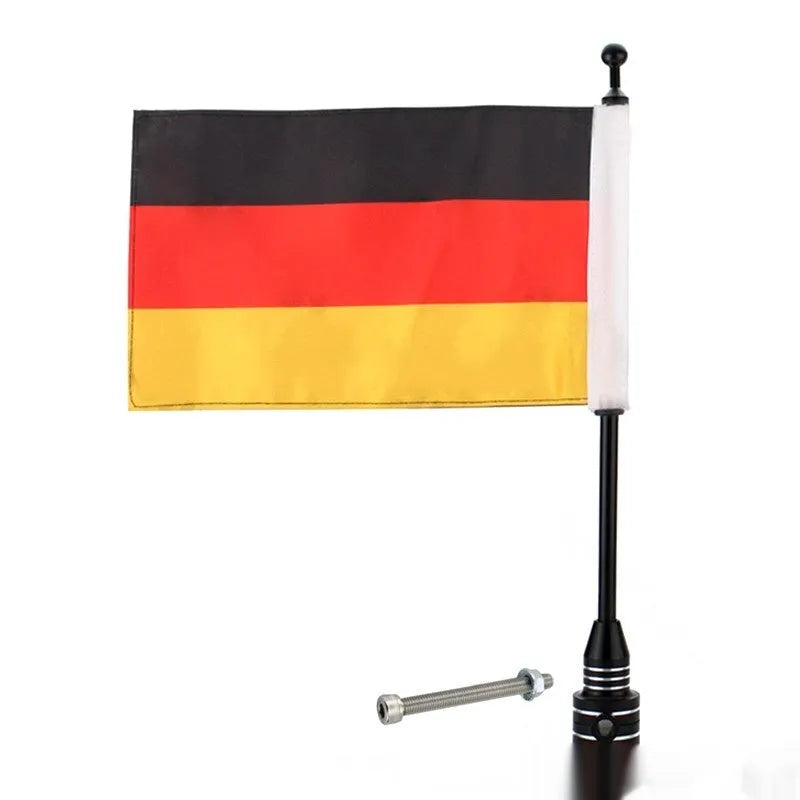 Silver electroplated tail box flagpole mounted on commercial vehicle parcel rack with German flag