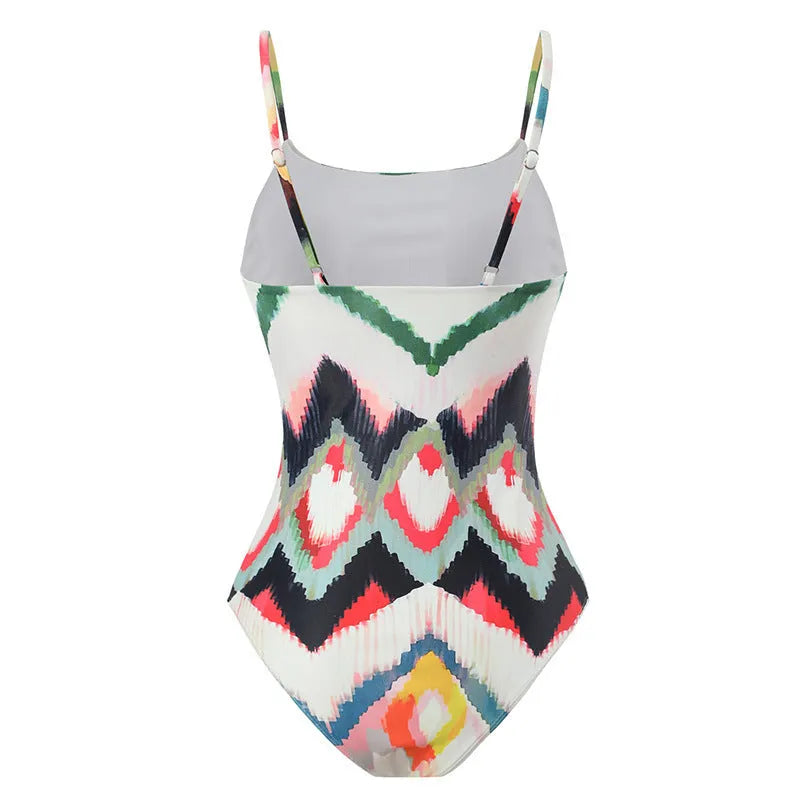 Women's two-piece swimsuit set with matching hip skirt in printed pattern