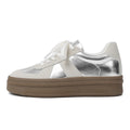 Retro round toe sports board shoes with cross shoulder strap detail in milky white colour