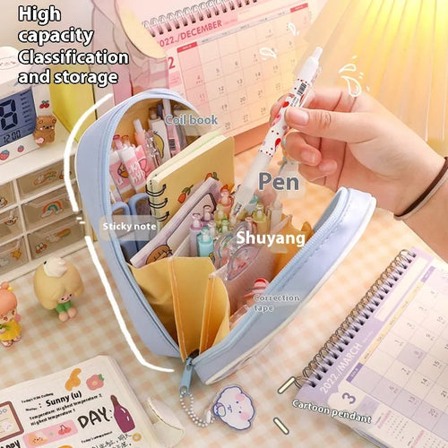 Transparent PVC pencil case with large capacity, featuring a cute Korean-style cartoon bear design.