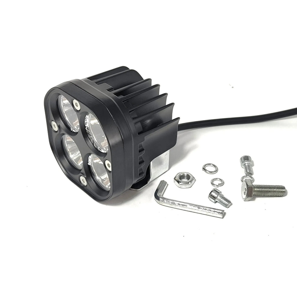 Four-eye vehicle spotlight with aluminium base plate showing white and yellow light options