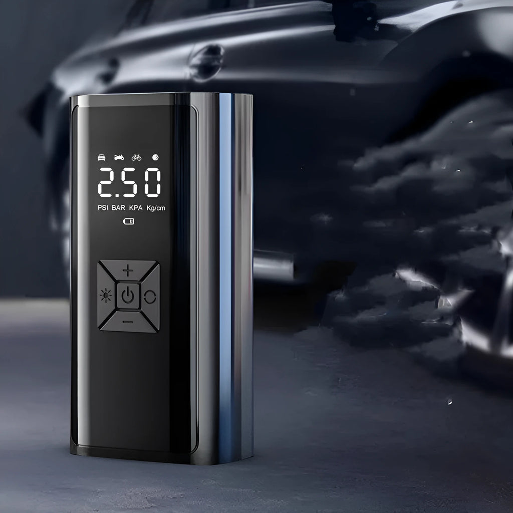 Portable wireless car tyre pump with digital display, LED light, and USB port on black ABS housing.