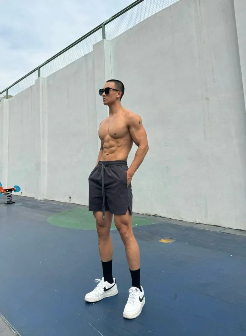 Men's ice silk quick-drying double-layer shorts in six colours with quarter-length design