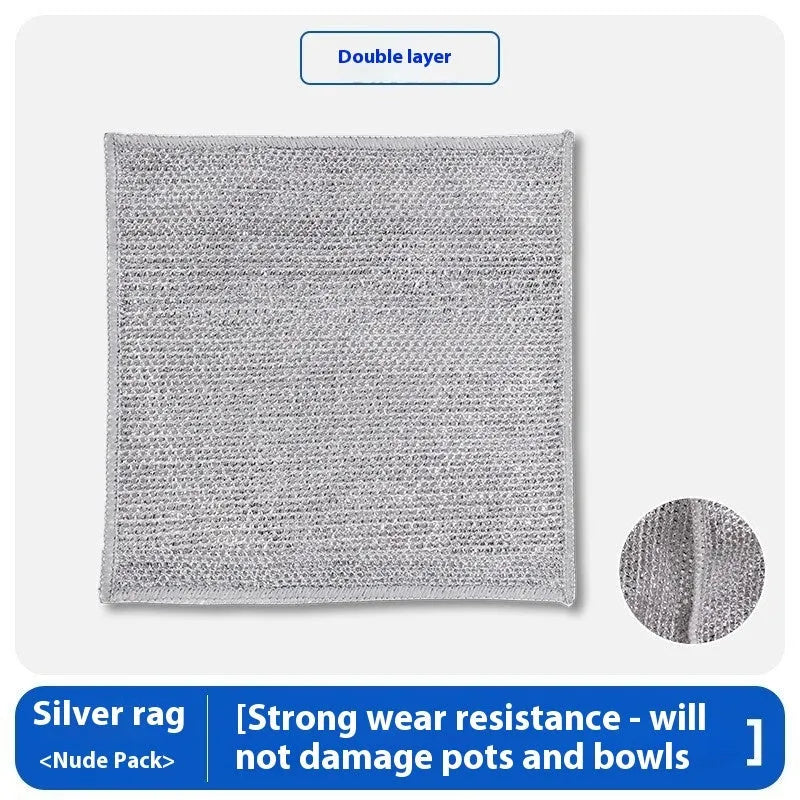 Silver microfiber cleaning rag with a built-in steel wire scrubber ball on a kitchen counter.