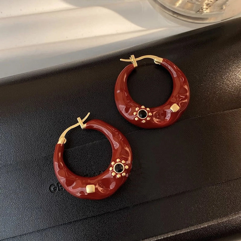 Hong Kong style retro ear studs with rhinestone inlay and dripping oil finish in black and red colours