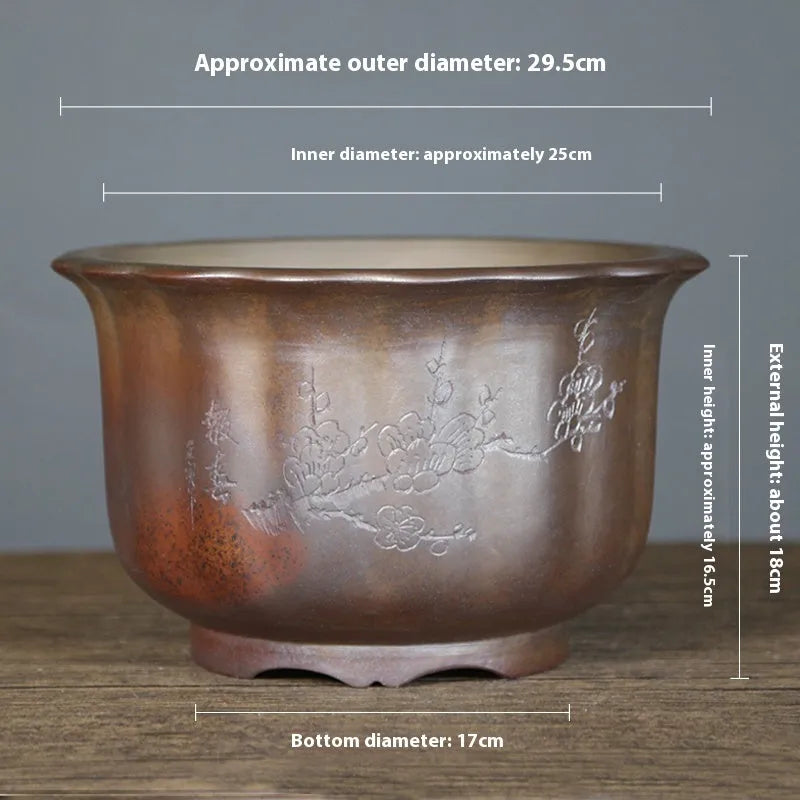 Indoor antique carved ceramic flowerpot in purple sand with a wood-burning finish, shown in large size.