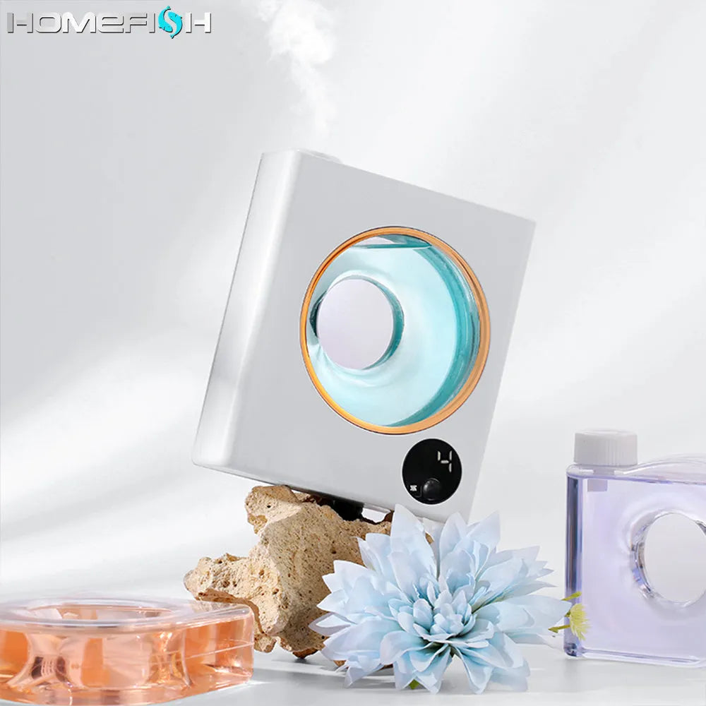 Small white wall-mounted automatic aromatherapy machine and essential oil diffuser.