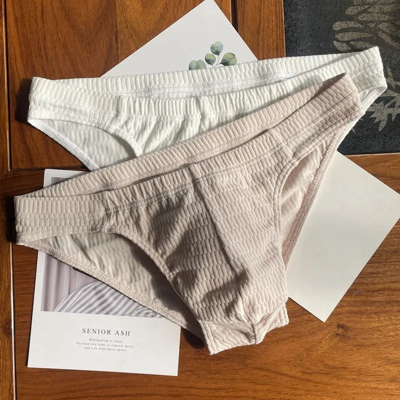 Men's solid colour cotton triangle underwear briefs showing mid waist design and available colour options