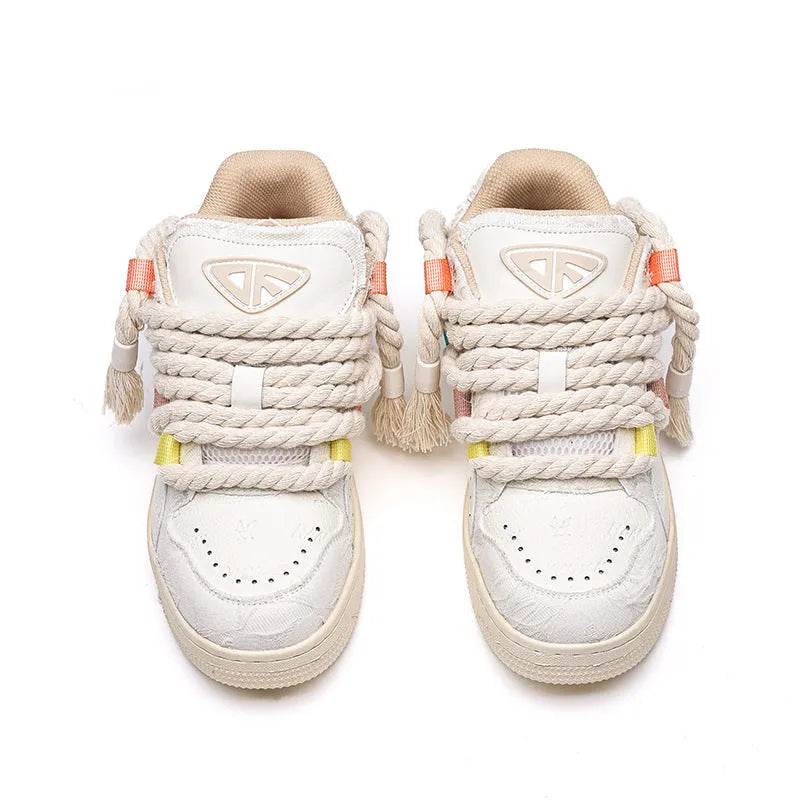 Creamy white women's retro lace-up skateboard shoes with low platform heel on rubber sole