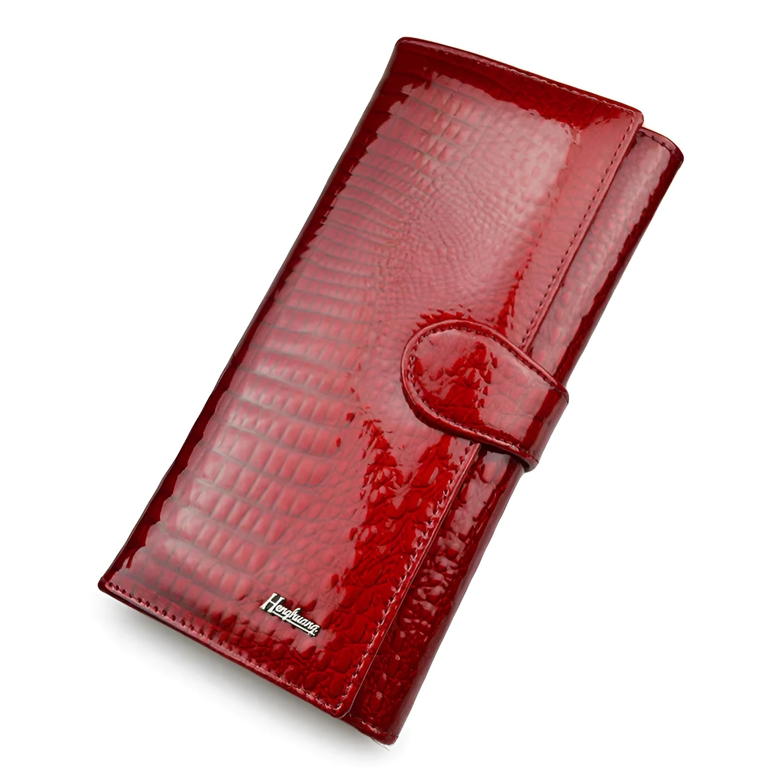 Women's red crocodile pattern patent leather coin purse with pigskin lining.