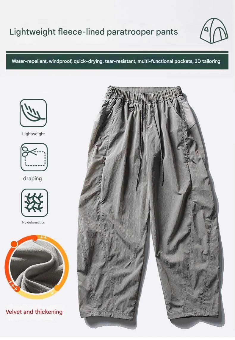 Fleece-lined quick-dry paratrooper cargo pants with water-repellent fabric, cargo pockets and adjustable cuffs, in Army green.