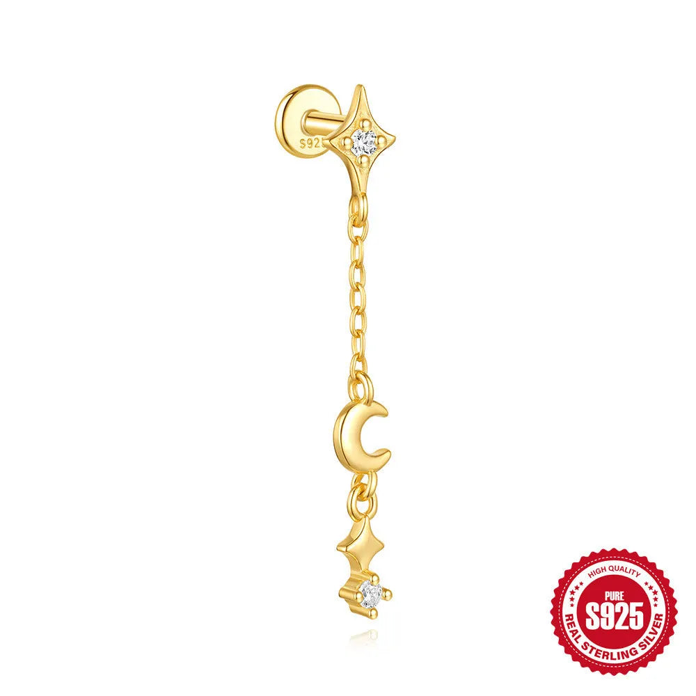 S925 sterling silver geometric moon and star earrings with diamond detail on a gold tone background.