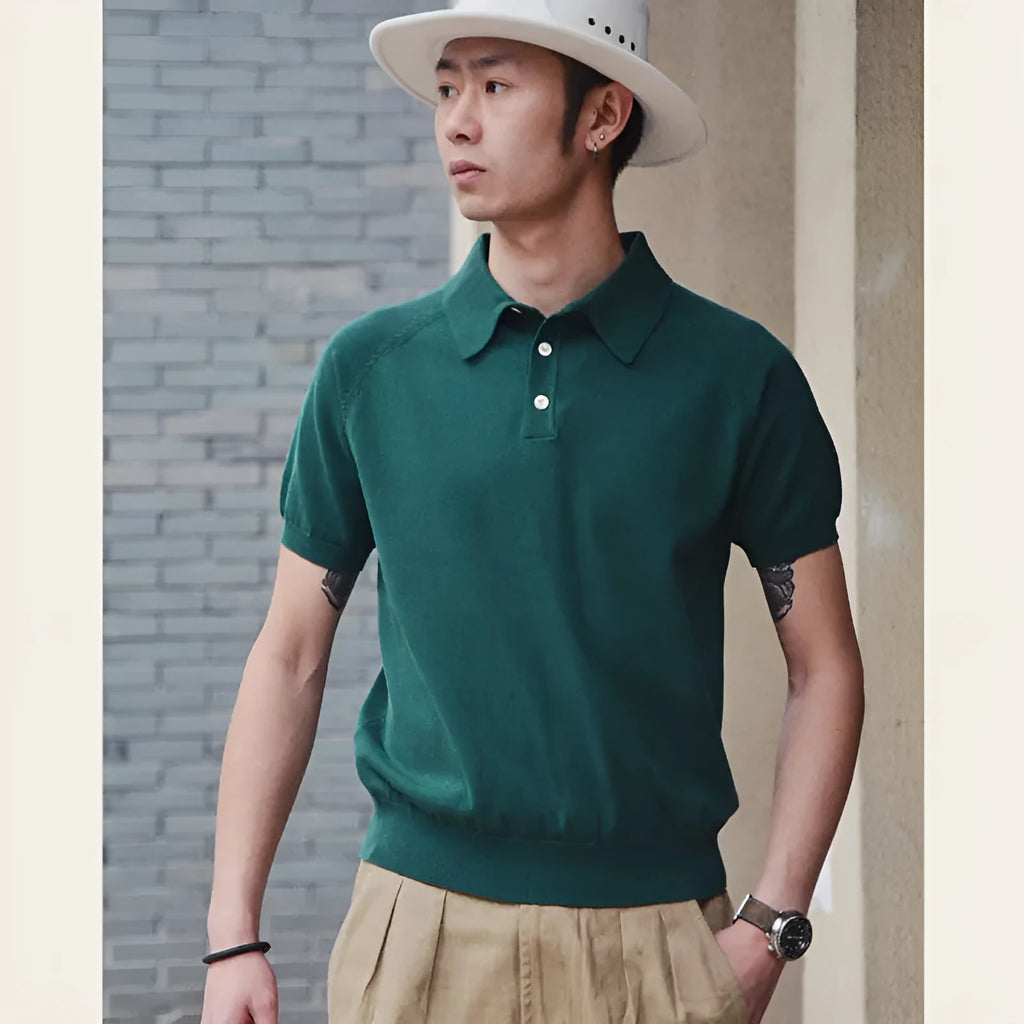 Retro slim fit knitted cotton short sleeve t-shirt in solid colour on a hanger.