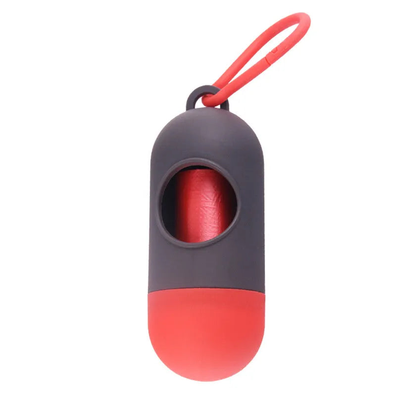 Small, lightweight dog poop bag holder showing side hook and Velcro strap for attachment.