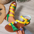 Women's flat sandals with Velcro straps in PU, showing round toe and rubber sole.