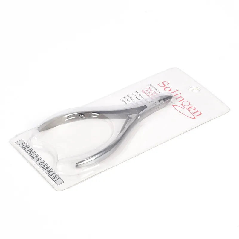 Silver stainless steel nail beauty pliers for manicure and pedicure grooming.