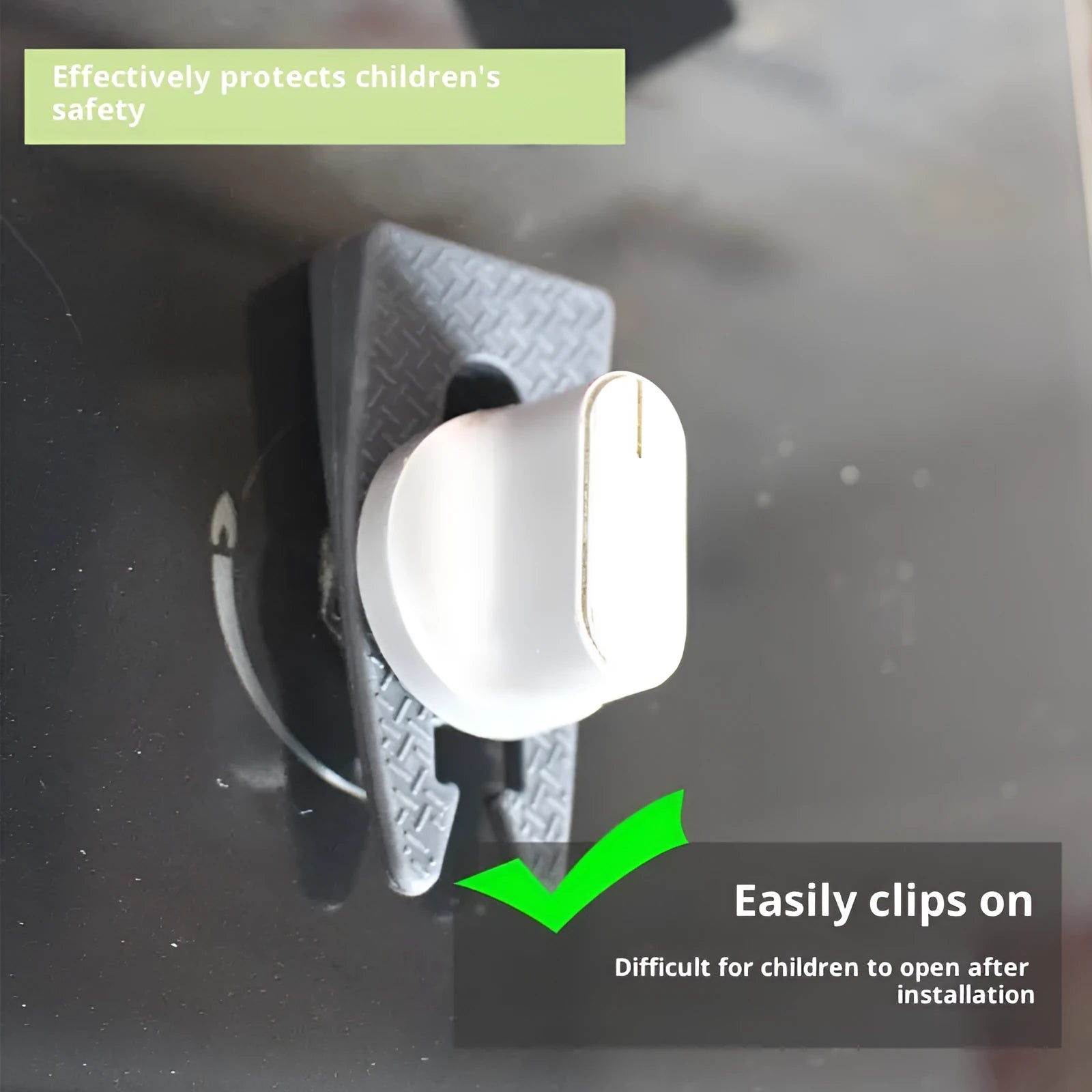Gray plastic gas stove knob safety lock clipped onto a gas cooker knob showing side profile
