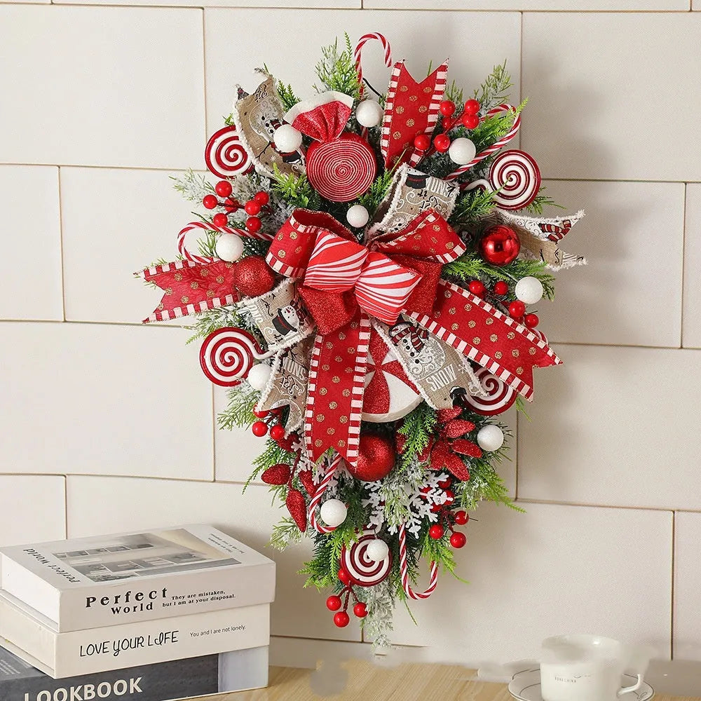 Artificial Christmas wreath with candy and upside-down tree design, 50cm or 60cm, yellow ribbon loops for hanging.