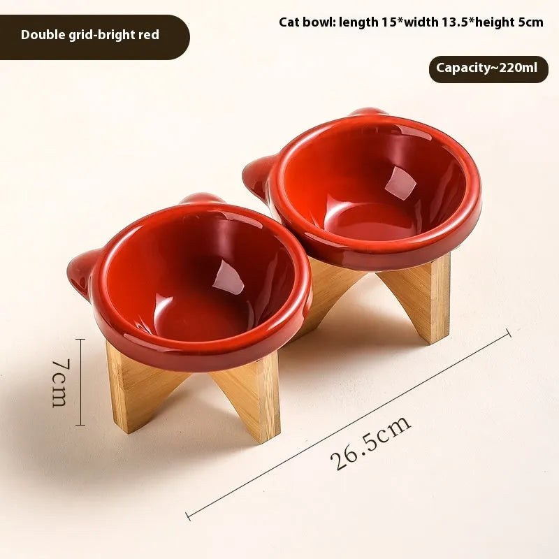 Porcelain cat drinking water bowl in bright red single grid configuration on surface